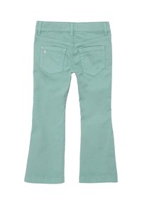 Miętowe bawełniane dżinsy w kształcie dzwonu o gładkiej fakturze, z dwoma tylnymi kieszeniami i dekoracyjnym szwem w pasującym kolorze.