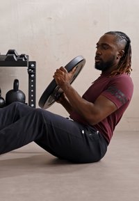 Champion ICON PANTS - Tepláky - black