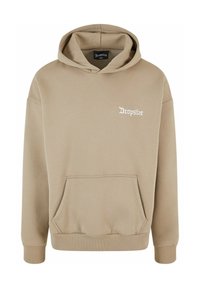 Sudadera con capucha beige hecha de tejido suave, con un bolsillo tipo canguro, puños de canalé y un logo en blanco en el lado izquierdo del pecho.