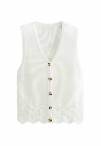 Weißes Strickweste mit V-Ausschnitt, fünf Holzknöpfen und einem gezackten Spitzenrand. Die Textur ist gerippt mit Durchbruchmuster am unteren Rand.
