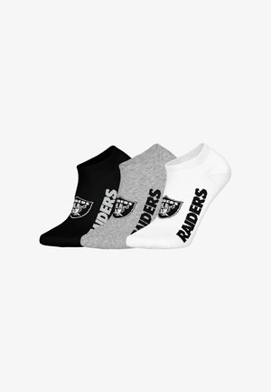 Three pairs of ankle socks in black, gray, and white. Each features the word "RAIDERS" and a logo in black. Cotton blend material.