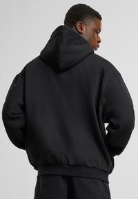 Karl Kani WAVY RETRO OS FULL - Sweatjakke - black