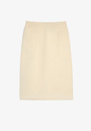 Beżowa bawełniana spódnica o prostym kroju, z dwiema przednimi kieszeniami, średnim stanem i zdobieniami w postaci szwów.