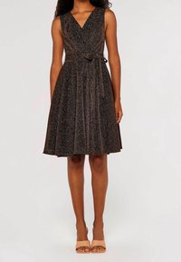 Black sleeveless dress with a V-neck, pleated skirt, and a tie at the waist. Fabric has a subtle metallic sheen, adding texture.