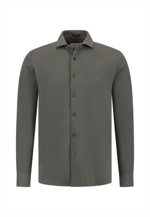 Ilgi piedurkņu krekls tumši zaļā audumā, ar pogām uz apkakles, priekšējām pogām un mazu logo uz krūšu. Gluda tekstūra.