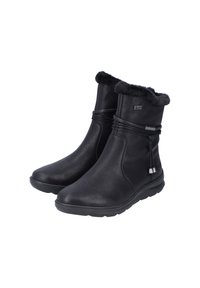 Bottines noires en cuir lisse, dotées d'une doublure en fausse fourrure douce, d'un nœud décoratif et d'accents métalliques, avec une semelle en caoutchouc flexible.