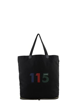Sac cabas noir avec longues anses, « 115 » multicolore imprimé sur le devant, et une fermeture éclair dorée le long du bord inférieur.