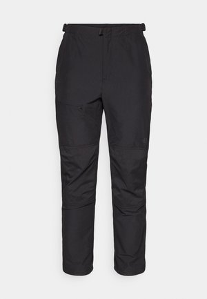 Sorte utendørsbukser laget av lett materiale, med en glatt overflate, elastisk midje, glidelåslomme og paneldetaljer på nederste del av bena.