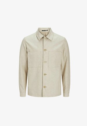 Hellbeige Knopfjacket aus strukturiertem Stoff, mit Kragen, zwei vorderen Taschen und geradem Schnitt mit langen Ärmeln.