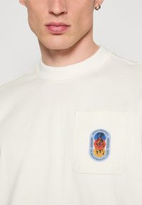 adidas Originals OLPC 2.0 - T-shirt - bas - cloud white