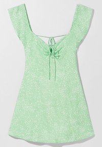 Green dress with a textured, speckled pattern. Short sleeves, V-neckline, and a tie detail at the back. Lightweight, casual design.