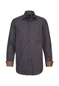 Camicia a maniche lunghe con stampa geometrica in blu navy e bianco. Presenta dettagli in marrone su polsini e colletto, realizzata in un morbido tessuto.