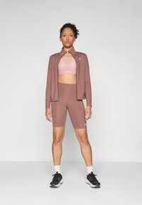 Under Armour MOTION BIKE SHORT - Leggings - sierra taupe/white