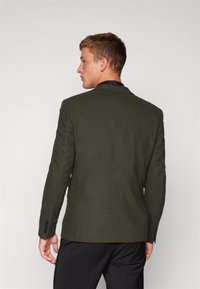 Lindbergh Suknjič - dark army mottled