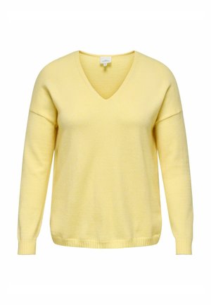 Pull jaune à col en V avec manches longues, fabriqué en tissu doux. Comprend des poignets et un ourlet côtelés. Design simple sans motifs ni accents.