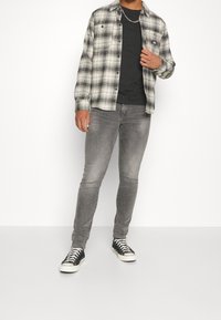 Levi's® Zúžené džíny - grey denim