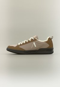 Sneakers featuring a combination of brown suede and tan leather. Rounded design with white lace, rubber sole, and subtle logo detail on the side.