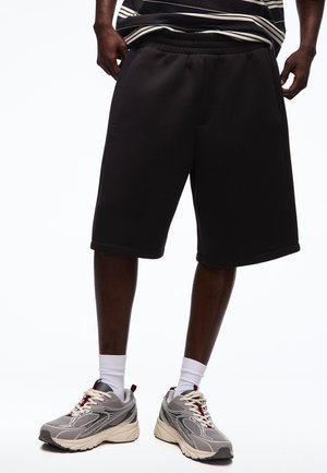 Bershka OVERSIZE BERMUDA - Tréningruha alsók - black