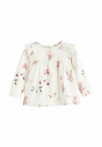 Witte blouse met lange mouwen en bloemenpatronen in roze en groen, met een gerimpelde halslijn en details van een verzamelde buste.
