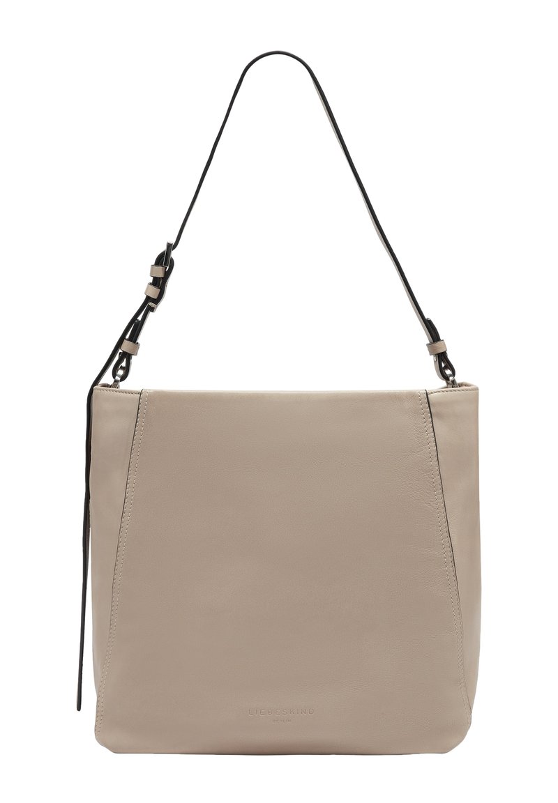 Beżowa skórzana torba na ramię o gładkiej fakturze, z czarnym regulowanym paskiem i minimalistycznym designem. Logo wytłoczone z przodu.