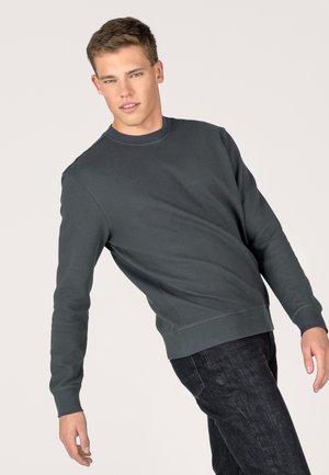 Dunkelgrüner, gerippter Sweatshirt mit rundem Halsausschnitt, langen Ärmeln und einer soliden, glatten Textur. Der Saum ist leicht elastisch für eine bessere Passform.