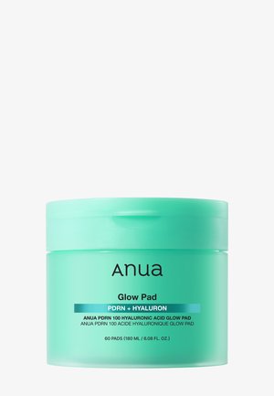Conteneur cylindrique vert d'Anua Glow Pad avec PDRN et acide hyaluronique, contenant 60 patchs pour le soin de la peau.