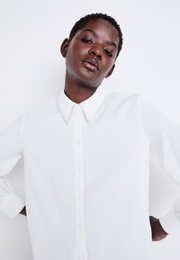 ONLY ONLVINEA LIFE SHIRT - Blúzka so zapínaním na gombíky - creme