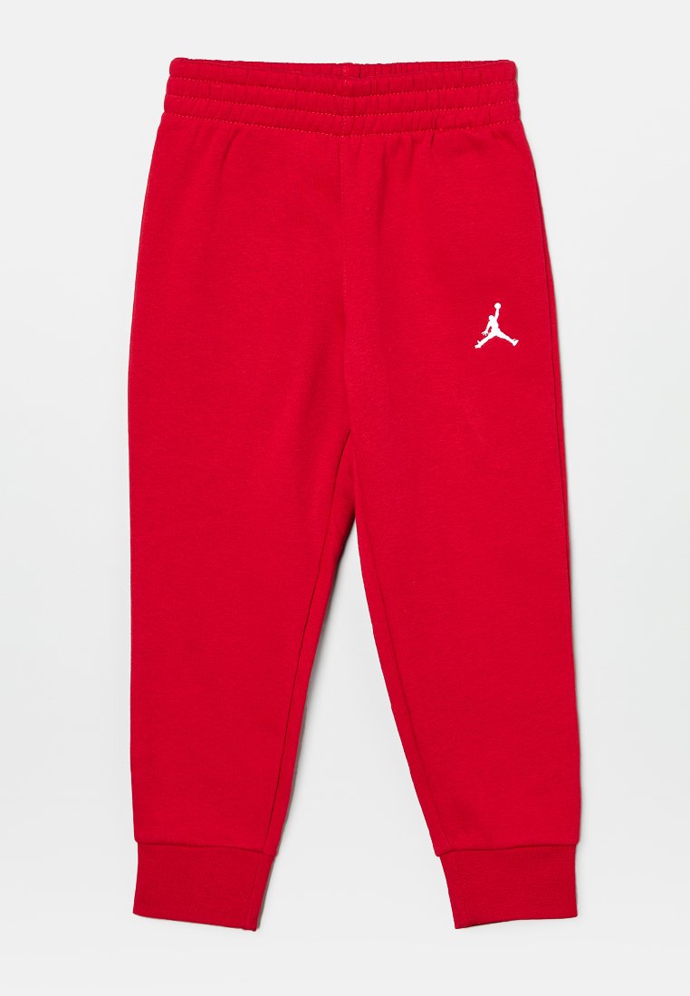 Rote Sweatpants aus weichem Material, mit einem elastischen Bund, schmal zulaufenden Bündchen und einem weißen Jumpman-Logo auf dem linken Oberschenkel.