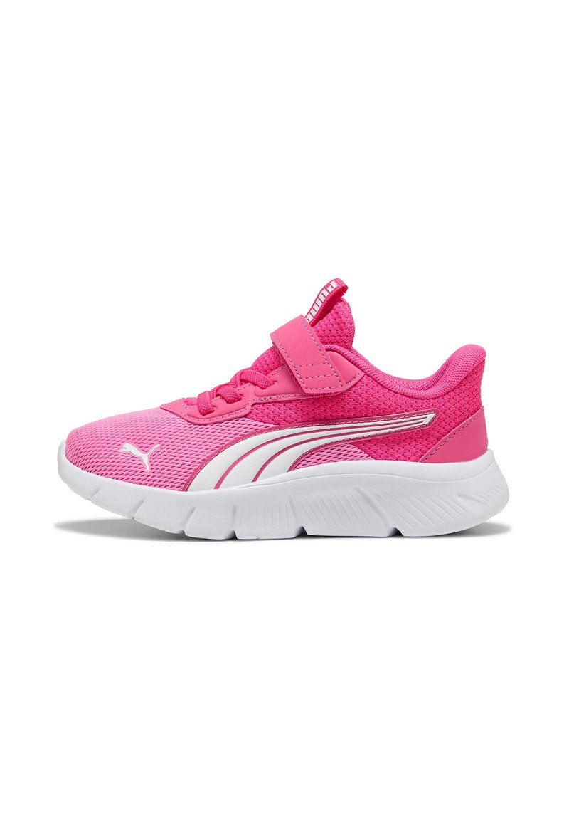 Pink athletic shoe with breathable mesh upper, Velcro strap, and white rubber sole. Features Puma branding and a textured design.