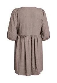Short-sleeve, textured dress in light brown with a round neckline and gathered waist, featuring a flowing, midi-length skirt.