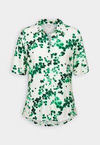 Camicia a maniche corte con bottone, caratterizzata da uno sfondo bianco con un motivo floreale verde e nero. Tessuto morbido, orlo arrotondato, colletto.