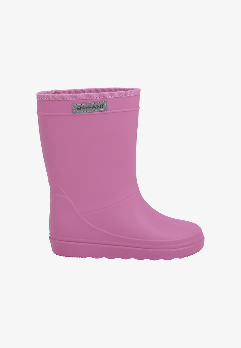 Botte de pluie en caoutchouc rose avec une tige texturée, finition lisse et une étiquette grise. Le design présente un bout arrondi et un tige flexible.