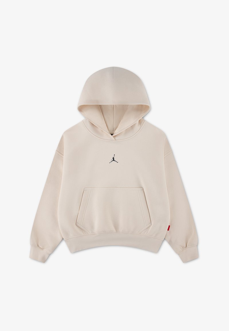 Sweat à capuche beige avec poche kangourou à l'avant et petit logo Jumpman noir centré sur la poitrine, présenté sur un fond uni.