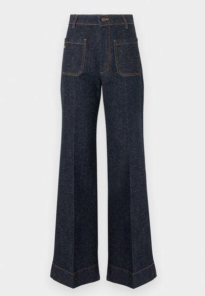 Σκούρο τζιν παντελόνι με φαρδιά μπατζάκια, έντονες ραφές, κλείσιμο με κουμπί και δύο πίσω τσέπες. Διαθέτει κλασική ψηλή μέση.