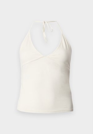 Λευκό τοπ χωρίς μανίκια με λαιμόκοψη halter, V-λαιμόκοψη και κλείσιμο με δέσιμο στο πίσω μέρος.