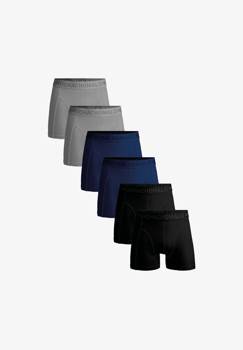 Šest bokseric v sivi, mornarski in črni barvi, z oprijetim krojem in črnimi elastikami v pasu z blagovno znamko "MUCHACHO MALO".