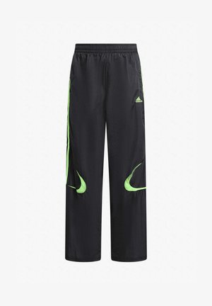 Pantalones deportivos negros con un ajuste holgado, con detalles en verde lima, cintura elástica y dos rayas laterales. Hechos de un material ligero.
