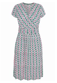 Bloemenjurk met een diepe V-hals, korte mouwen en een getailleerde taille. Gemaakt van lichtgewicht stof met een patroon van groene en roze bloemen op een witte achtergrond.