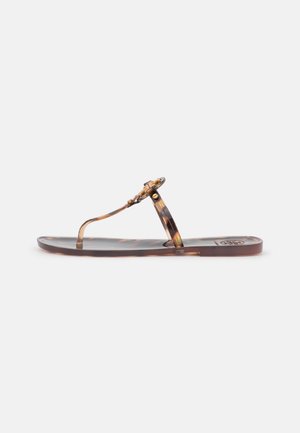 Tortoiseshell-patterned flip-flop sandal with clear straps and a gold-tone decorative element on the toe post; flat footbed.