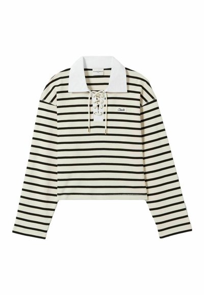 Maglia a maniche lunghe a righe in crema e nero, con colletto bianco e apertura lacciata. Presenta un design cropped e un piccolo logo sul lato sinistro del petto.