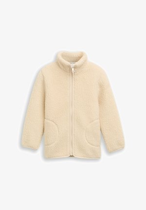 Jachetă din fleece de culoare crem, cu guler înalt, fermoar complet și buzunare rotunjite. Suprafață texturată dintr-un material moale și cald.