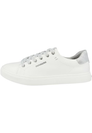 White leather sneakers with silver detailing, round toe, lace-up closure, and textured rubber sole. Features "Dockers" branding on the side.