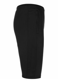 Pantaloni sportivi neri realizzati in un tessuto morbido, con una vita elasticizzata e tasche laterali. Progettati per il comfort con un taglio lungo fino al ginocchio.