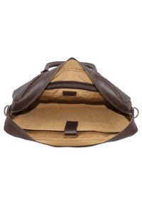 Braune Lederhandtasche mit Reißverschluss, ausgestattet mit einem geräumigen, beigen Innenraum, einer flachen Tasche und einem Ledertragegurt für sicheren Stauraum.