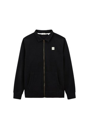 Veste noire zippée en tissu doux, dotée d'un col pointu, de deux poches avant et d'une petite patch logo sur la poitrine.