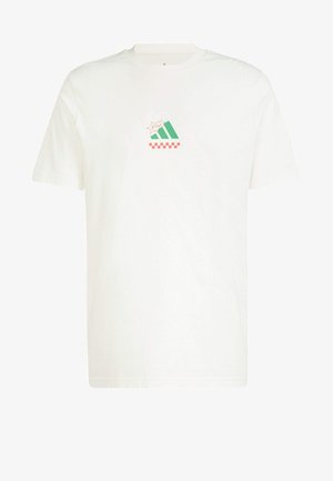 T-shirt en coton blanc présentant un design graphique vert et rouge sur la poitrine, à manches courtes et coupe décontractée.