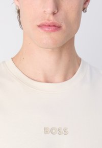 BOSS TEE - Basic T-shirt - open white