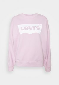 Sweatshirt rose clair en coton avec un col rond côtelé. Présente un grand logo Levi's blanc sur le devant avec une légère brillance.