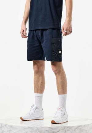 CHIYODA PARACHUTE POCKET - Tracksuit bottoms - navy