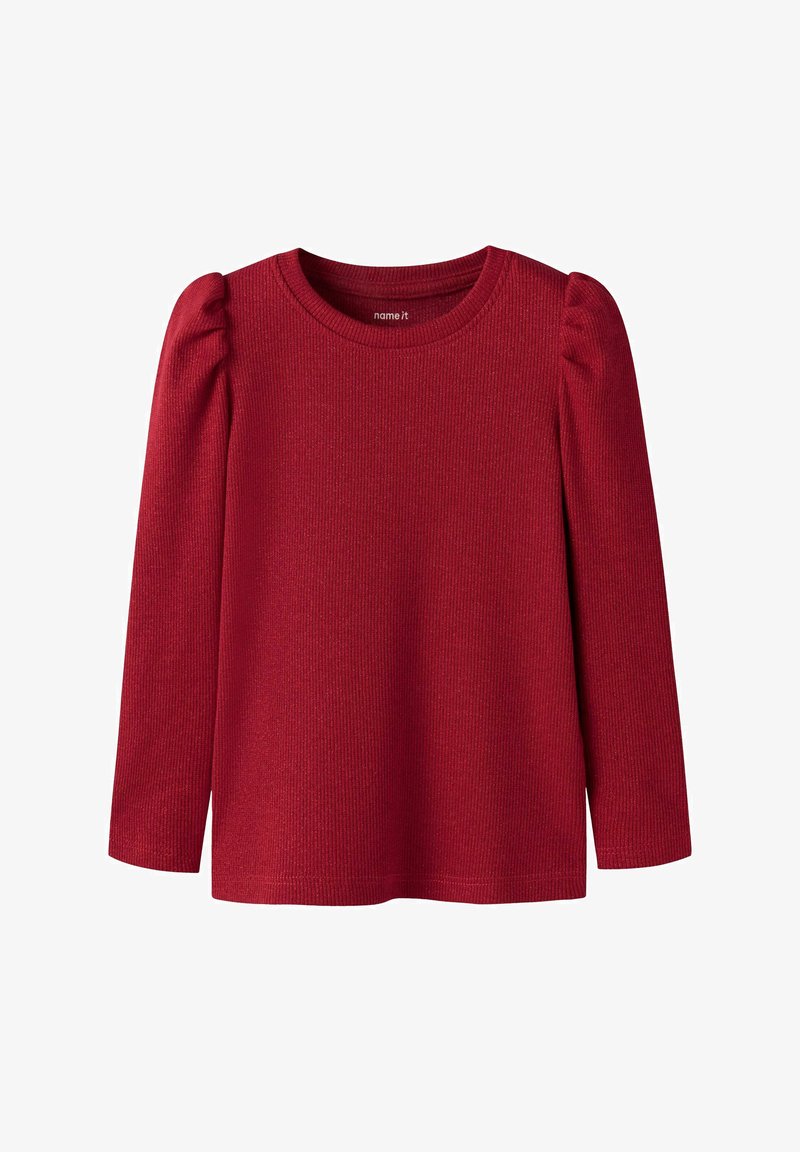 Top rojo de manga larga con textura acanalada y hombros abullonados. Cuenta con un escote redondo y un dobladillo recto. Está hecho de una tela suave.